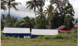 Mesin tromol penggilingan emas terletak di Desa Moyag kawasan pertanian